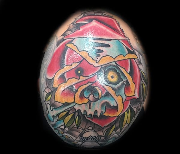 skull head flower tattoo