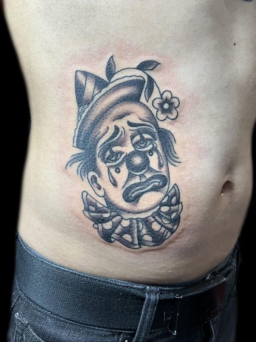 sad clown tattoo