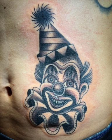 black and grey clown face, Jason Tritten, artist at Revolt Tattoos