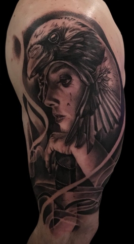 angel and bird tattoo
