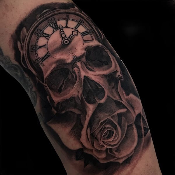 skull and flower tattoo
