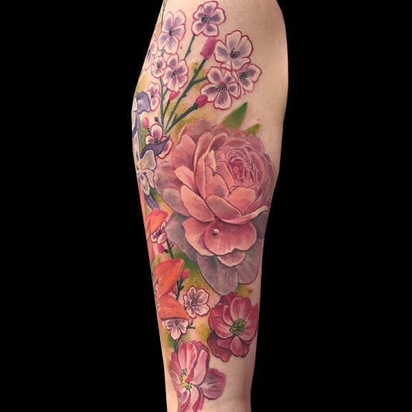 realistic flowers tattoo