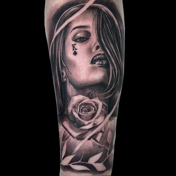 woman face and rose tattoo