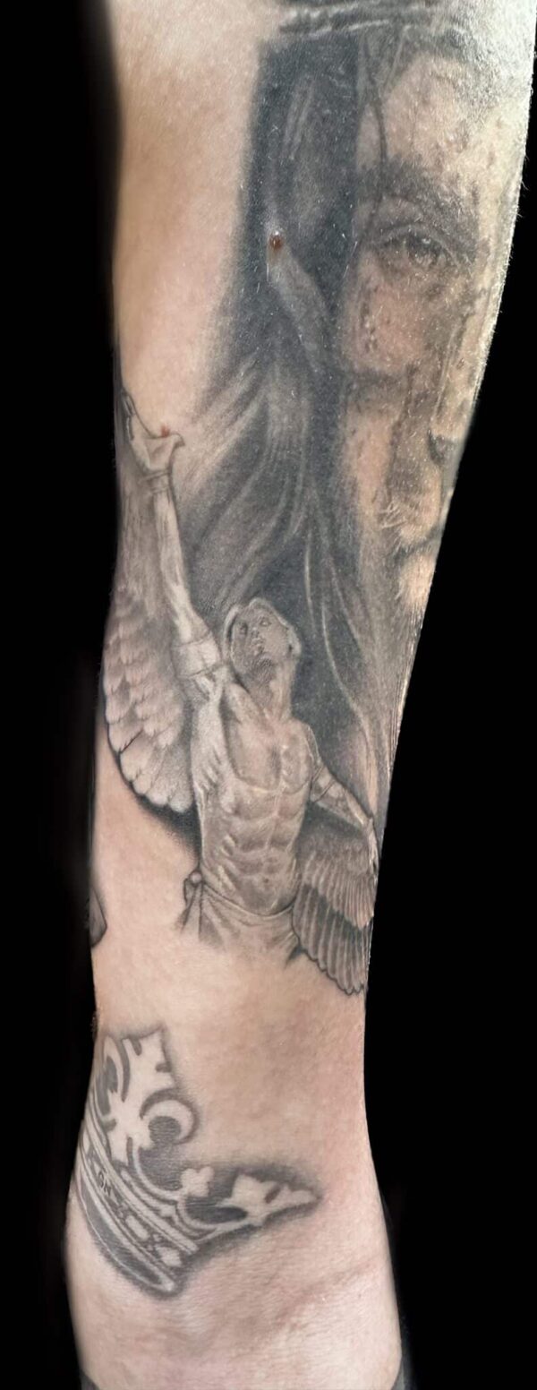healed statue tattoo