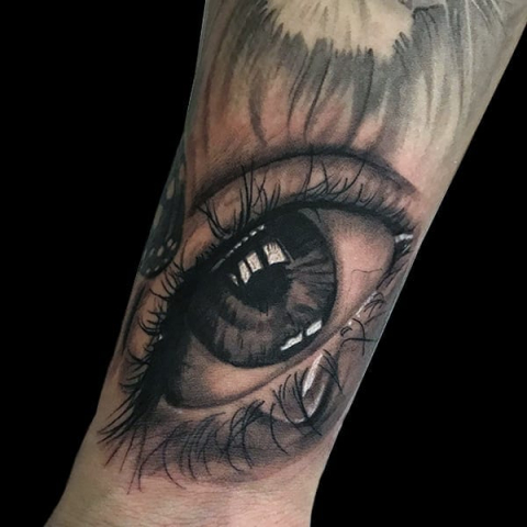realistic crying eye tattoo