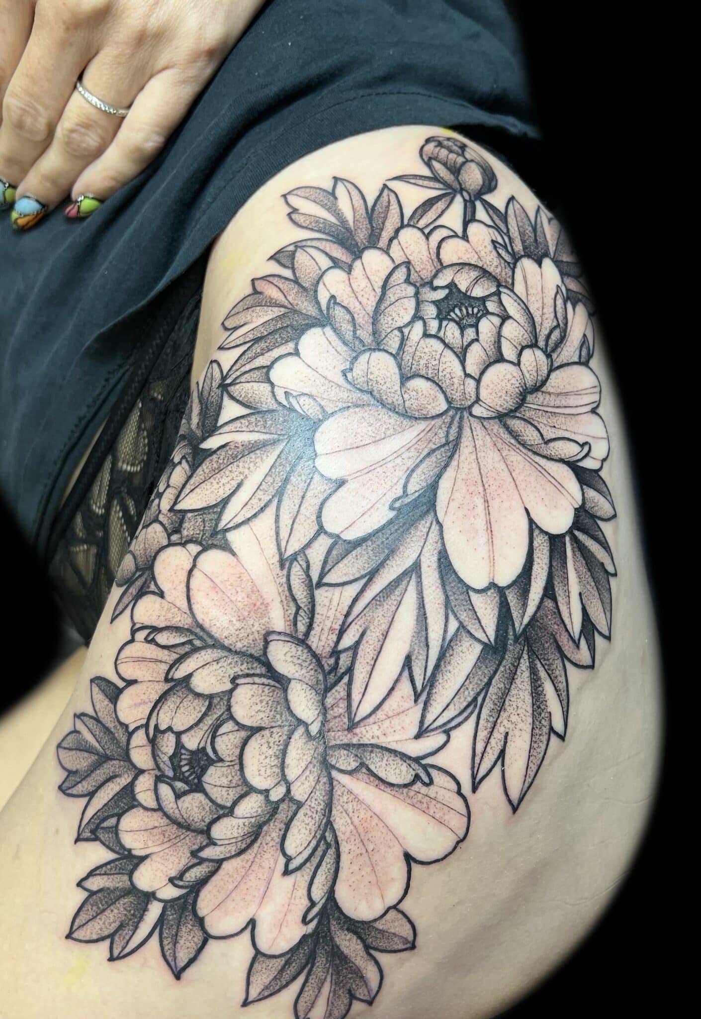 floral black and grey thigh piece, Jason Tritten, artist at Revolt Tattoos