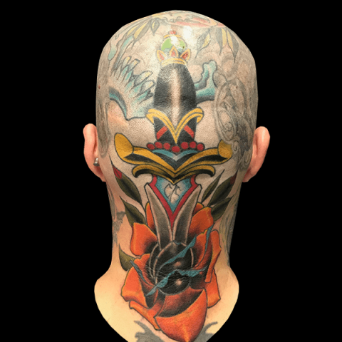 flower and dagger neck tattoo