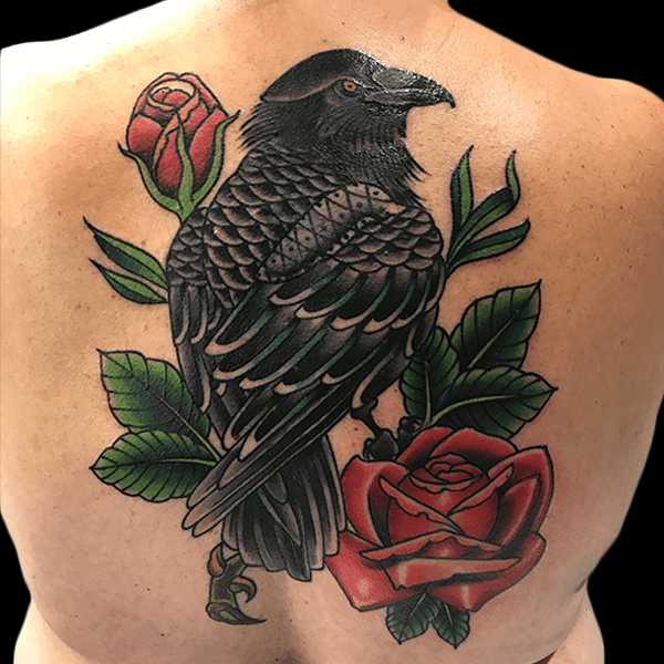 traditional raven backpiece tattoo