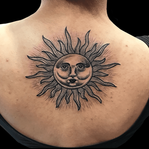 sun backpiece tattoo