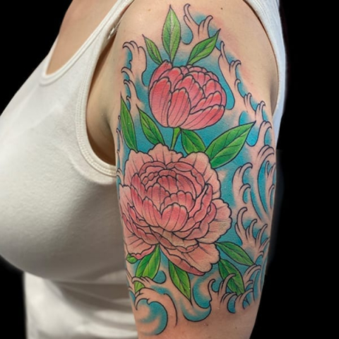 floral half sleeve tattoo