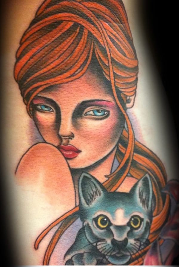 woman and cat tattoo