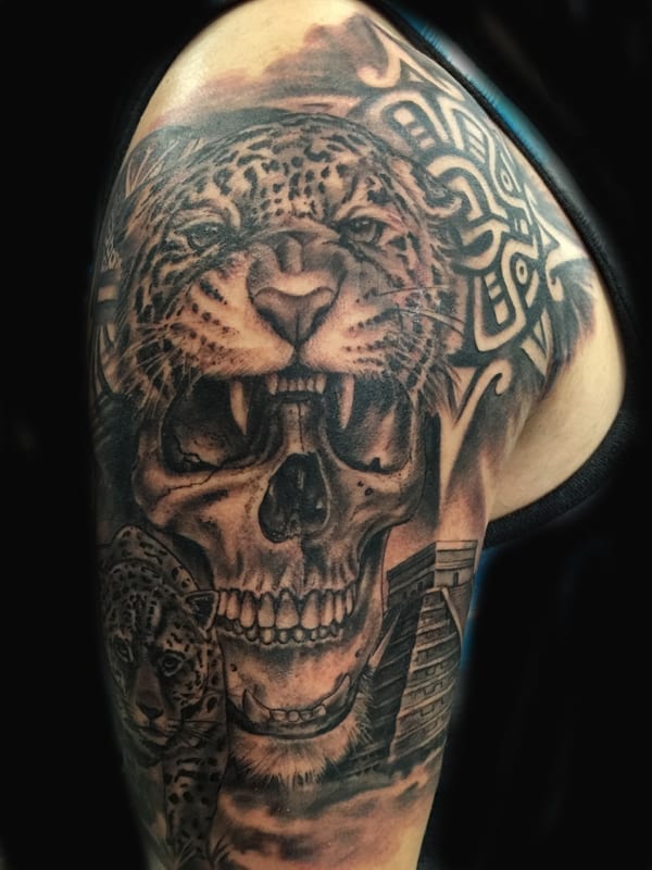 skull and leopard aztec tattoo