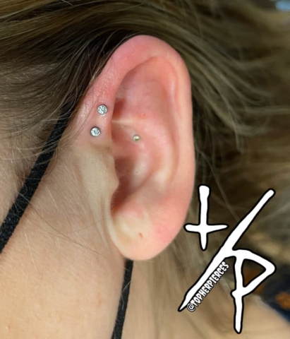 cartilage and conch piercings