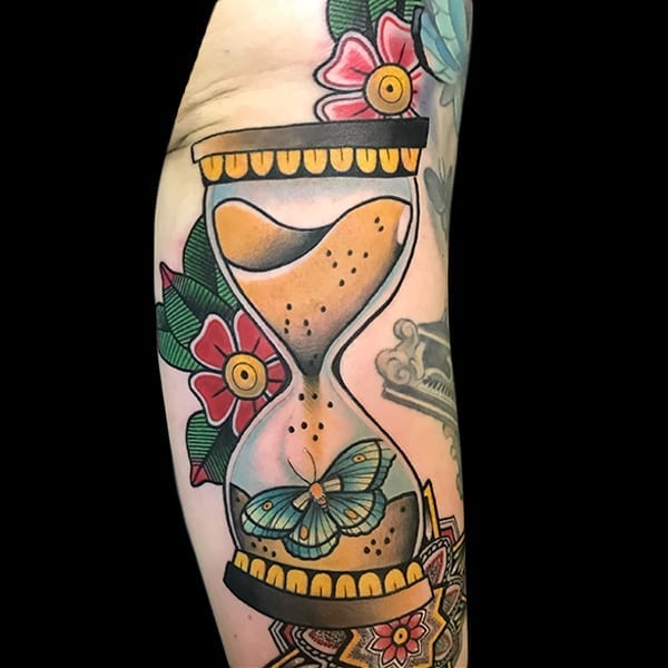 hourglass tattoo, Elijah Nguyen, Artist at Revolt Tattoos