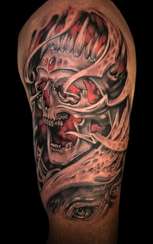 skull skin rip tattoo, Elijah Nguyen, Artist at Revolt Tattoos
