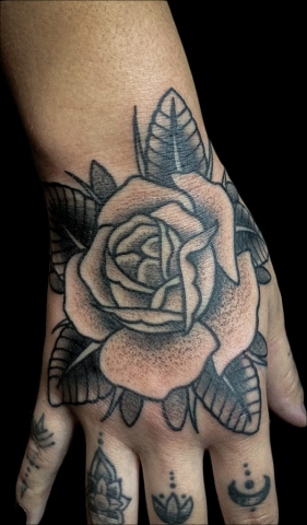 flower hand tattoo, Elijah Nguyen, Artist at Revolt Tattoos