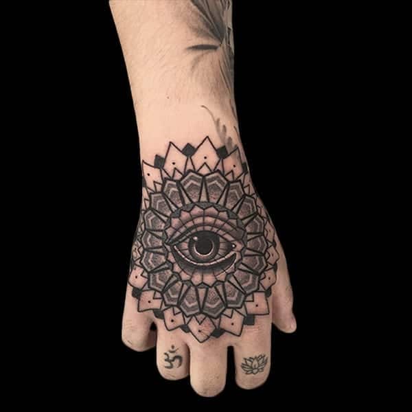 geometric hand design, Elijah Nguyen, Artist at Revolt Tattoos