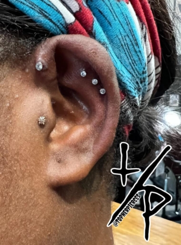 helix, tragus and forward helix piercing