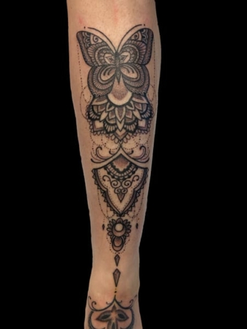 moth mandala tattoo