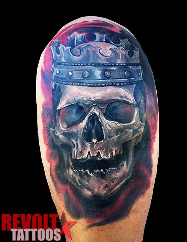 realistic skull with crown tattoo