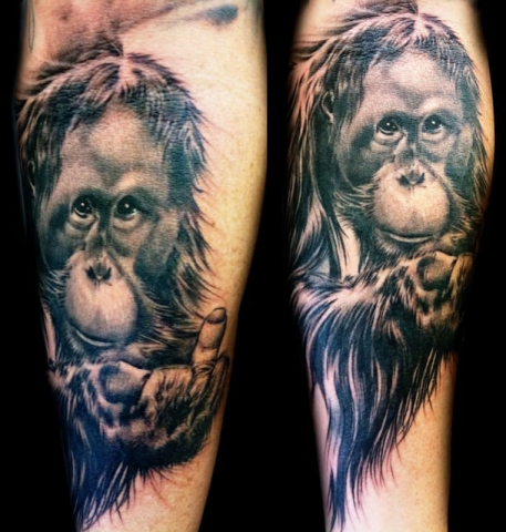 realistic chimpanzee portrait tattoo