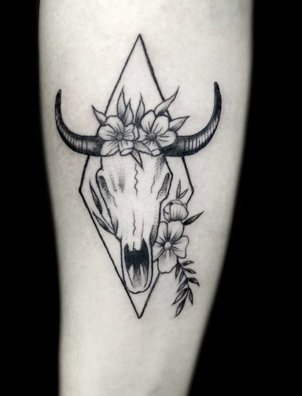 Deer skull floral tattoo