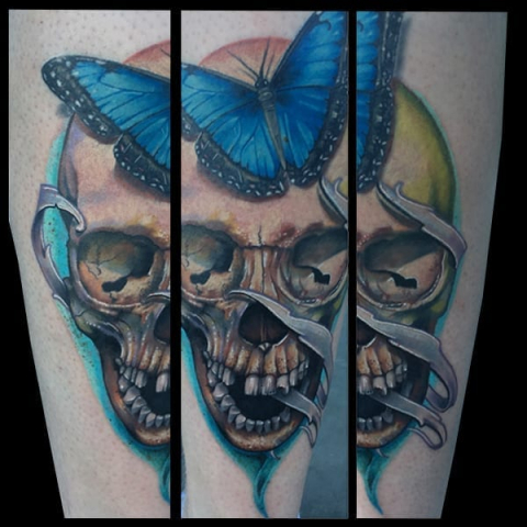 Skull butterfly tattoo