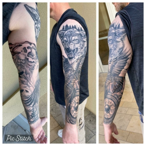 black and grey realistic wolf tattoo,Tattoo by Krystof, Artist at Revolt Tattoos