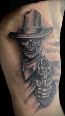 black and grey western skull tattoo
