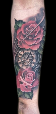 Floral stopwatch tattoo