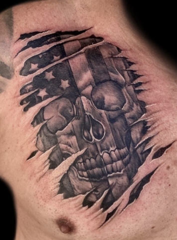 American flag skull skin rip tattoo