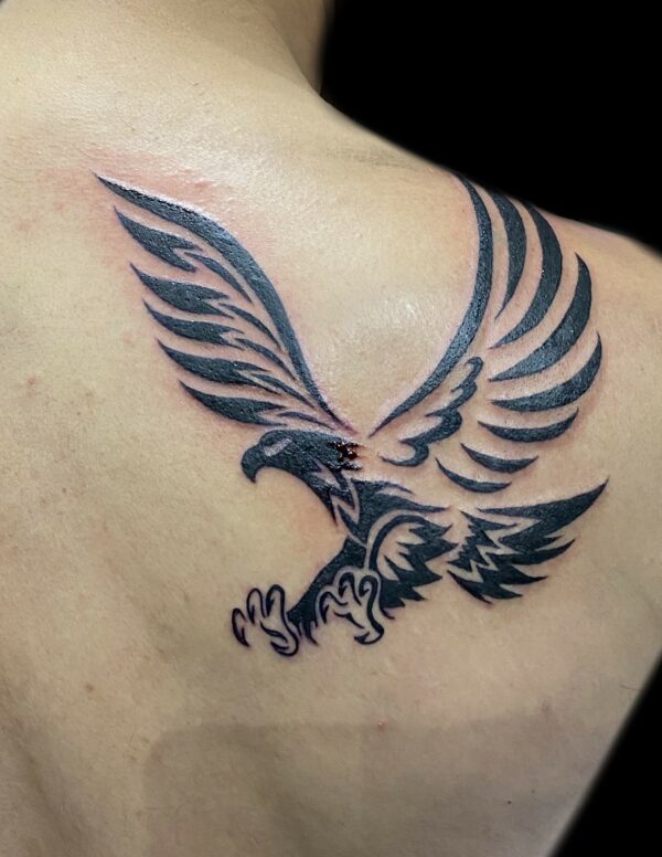 Tribal phoenix tattoo