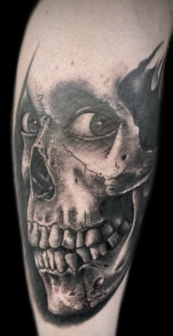 black and grey skull tattoo