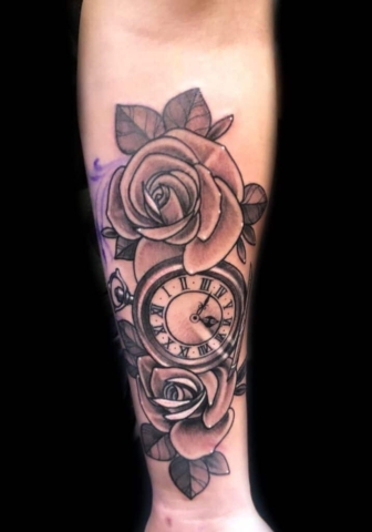 flower and pocketwatch tattoo