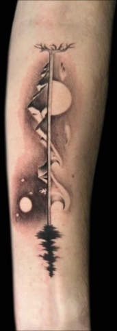 black and grey arrow design, nature tattoo, Steve Rivas, artist at Revolt Tattoos