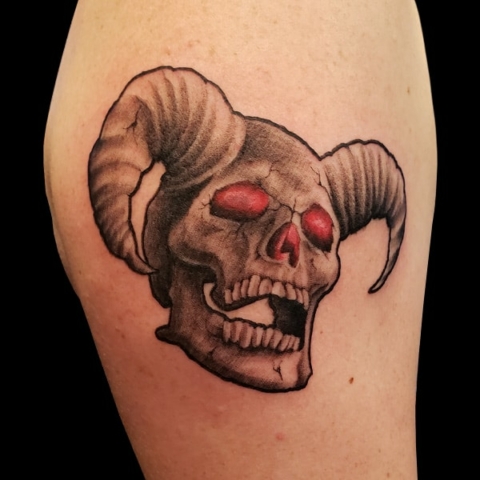 black and grey skull tattoo