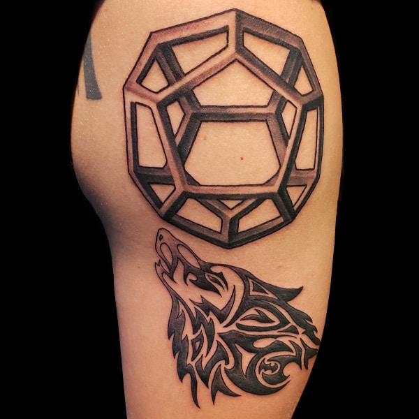 tribal wolf geometric tattoo
