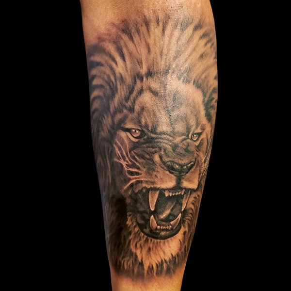 realistic lion tattoo design