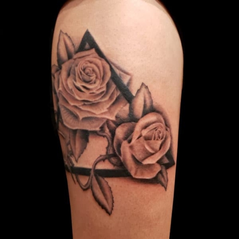 triangle and flower tattoo