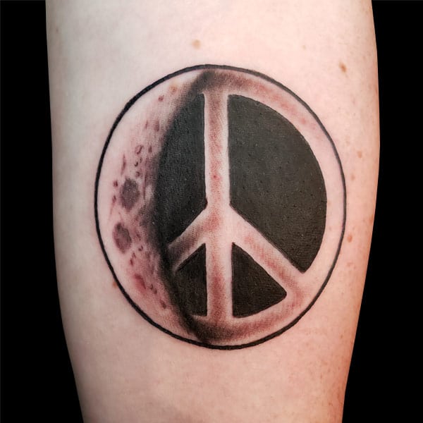 peace sign moon tattoo