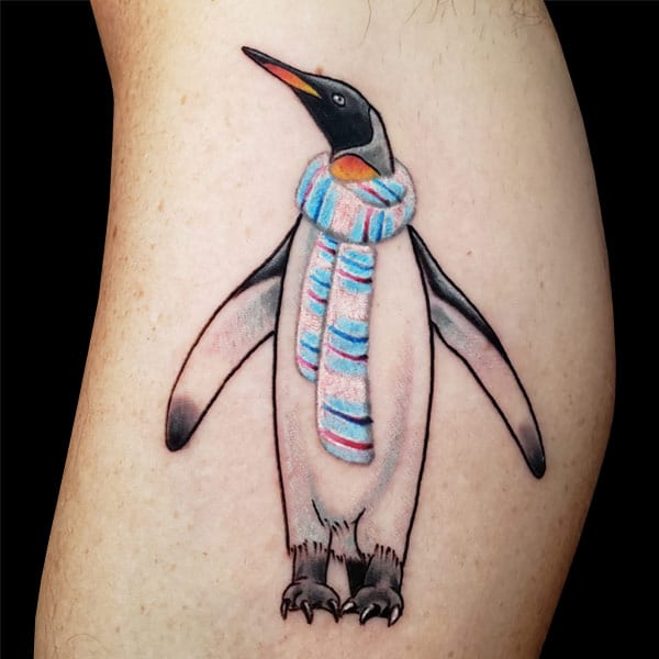 color realism penguin tattoo