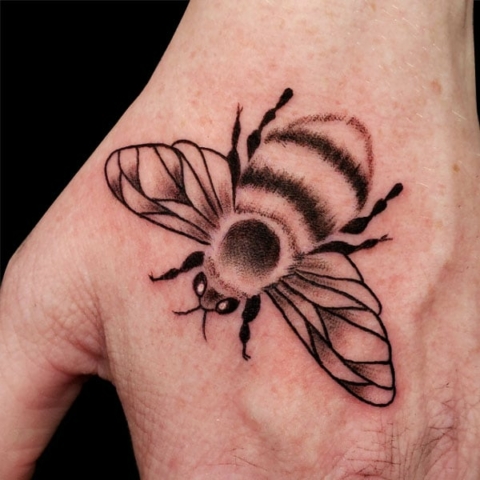 bee hand tattoo