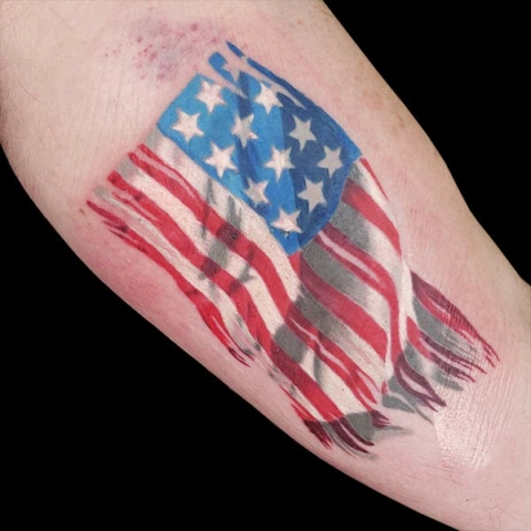 american flag color realism tattoo