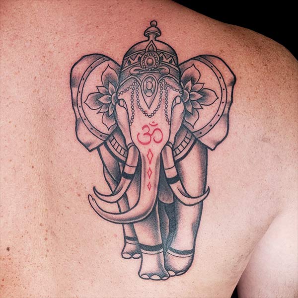 elephant aum symbol tattoo