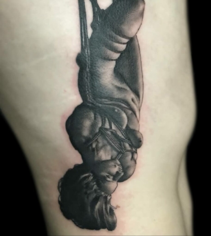 Realistic roped woman suspension tattoo
