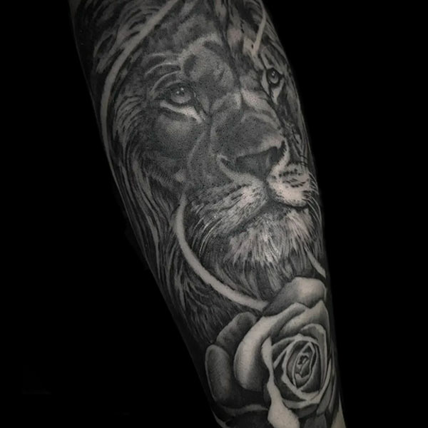 lion and flower tattoo