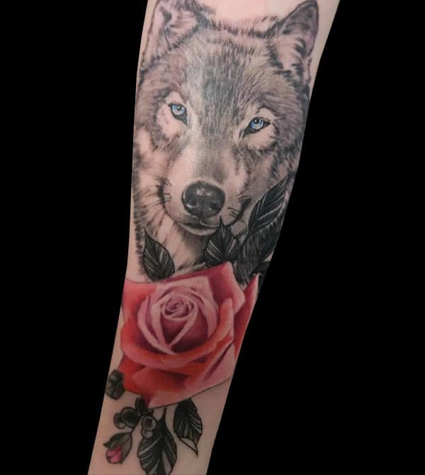 realistic wolf and rose tattoo