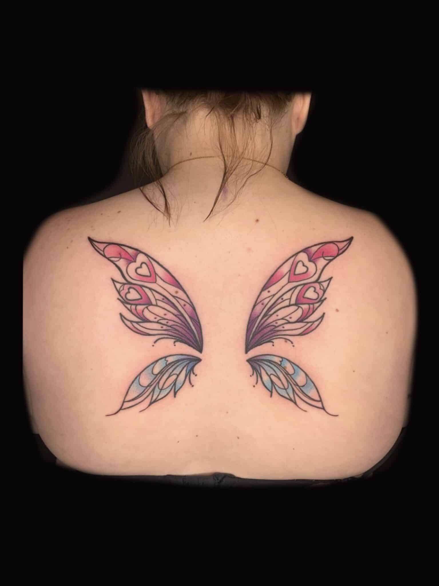 Fairy wing back piece tattoo