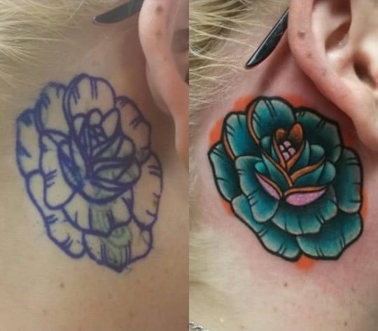 traditional flower behind ear tattoo