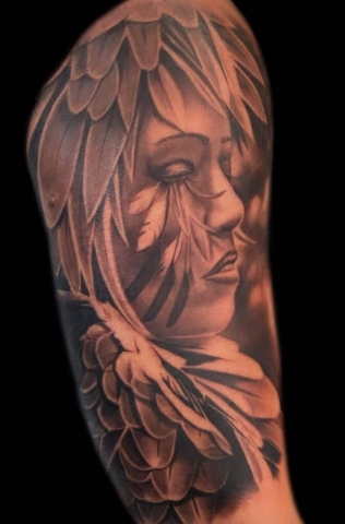 realistic feather tattoo